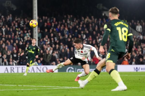 Harry Wilson stoops to head the ball