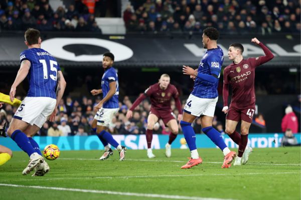 Phil Foden of Manchester City scores his third goal