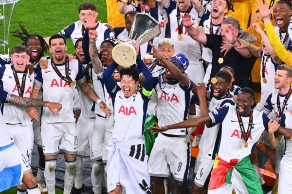 Son Heung-Min Lifts the Trophy