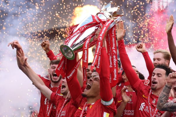 Virgil van Dijk Lifts Premier League Trophy